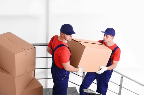 Boxes and furniture prepared for house removal in Marks Gate