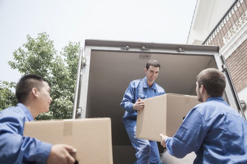 Loading furniture for a man and van job in Marks Gate