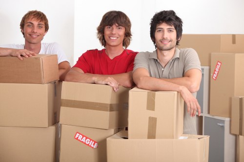 Packed boxes and moving supplies ready for a removals service