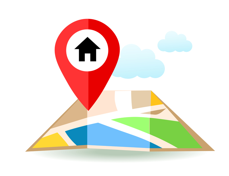 Professional movers packing household items for a local move